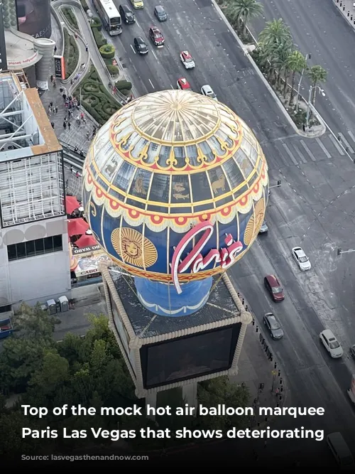 Top of the mock hot air balloon marquee at Paris Las Vegas that shows deteriorating paint.