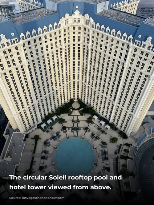 The circular Soleil rooftop pool and Paris' hotel tower viewed from above.