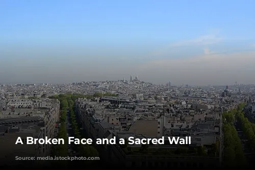 A Broken Face and a Sacred Wall