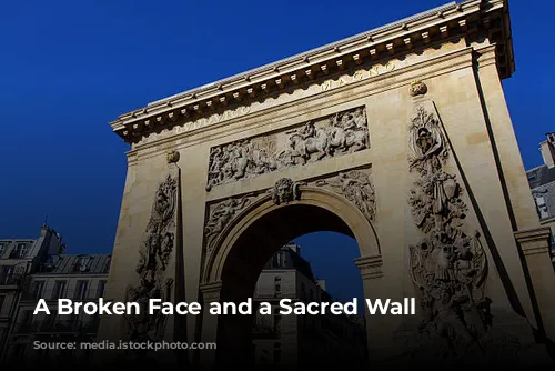 A Broken Face and a Sacred Wall