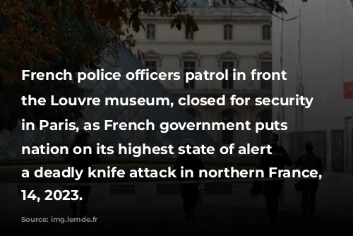 French police officers patrol in front of the Louvre museum, closed for security reasons, in Paris, as French government puts the nation on its highest state of alert after a deadly knife attack in northern France, October 14, 2023.