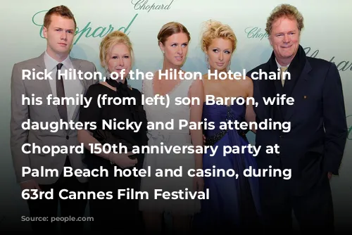 Rick Hilton, of the Hilton Hotel chain with his family (from left) son Barron, wife Kathy, daughters Nicky and Paris attending the Chopard 150th anniversary party at the Palm Beach hotel and casino, during the 63rd Cannes Film Festival