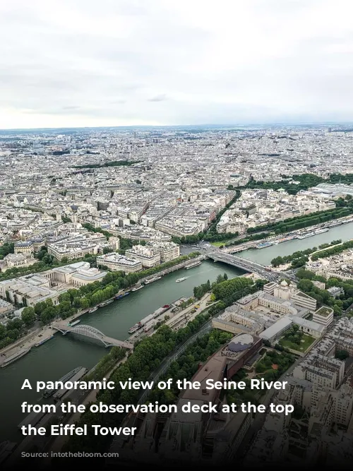 A panoramic view of the Seine River seen from the observation deck at the top of the Eiffel Tower