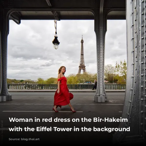 Woman in red dress on the Bir-Hakeim bridge with the Eiffel Tower in the background