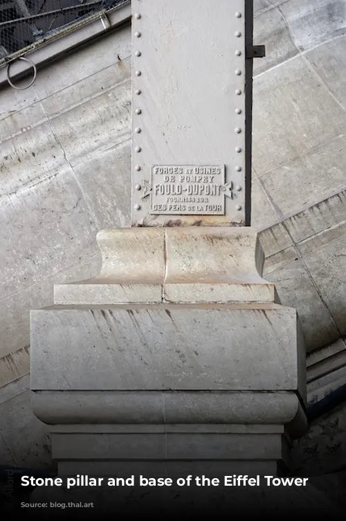 Stone pillar and base of the Eiffel Tower