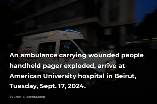 An ambulance carrying wounded people whose handheld pager exploded, arrive at the American University hospital in Beirut, Lebanon, Tuesday, Sept. 17, 2024.