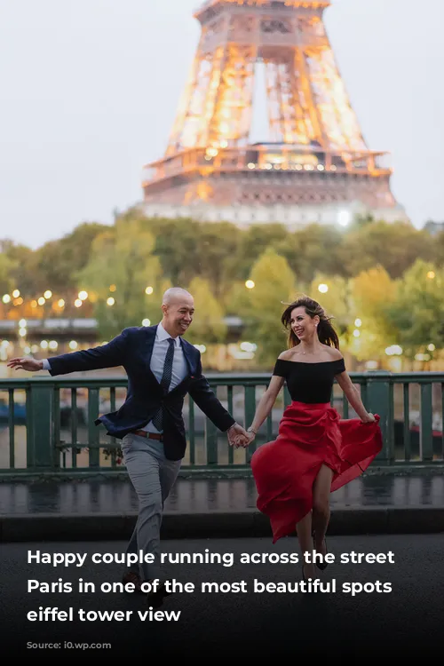 Happy couple running across the street in Paris in one of the most beautiful spots with eiffel tower view