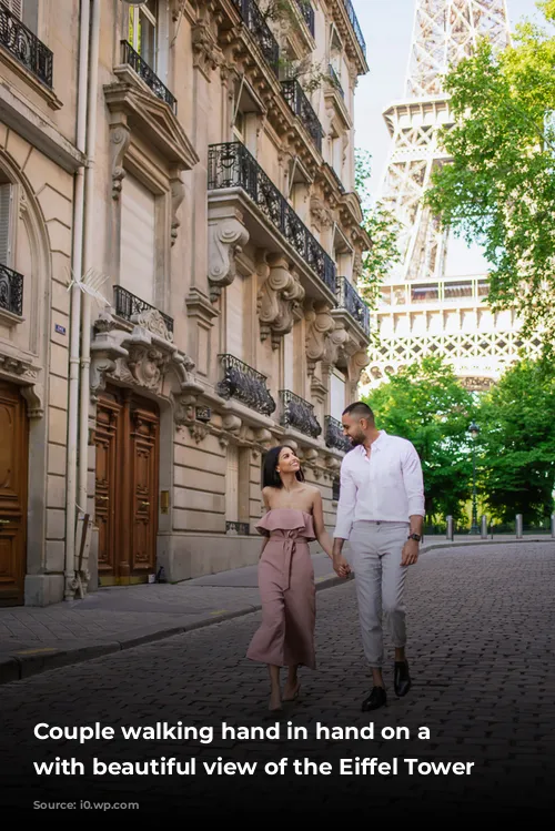 Couple walking hand in hand on a street with beautiful view of the Eiffel Tower