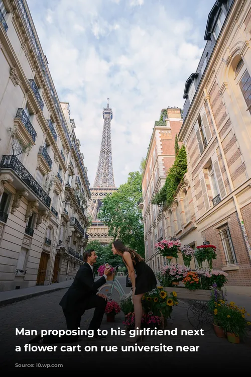 Man proposing to his girlfriend next to a flower cart on rue universite near Eiffel