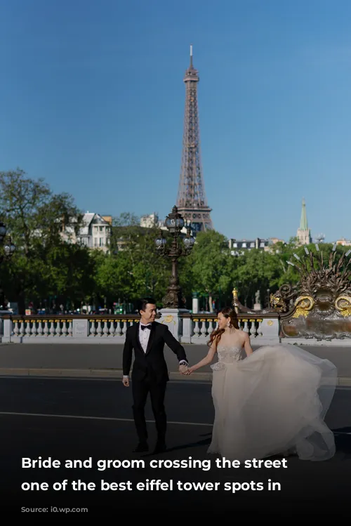 Bride and groom crossing the street in one of the best eiffel tower spots in Paris