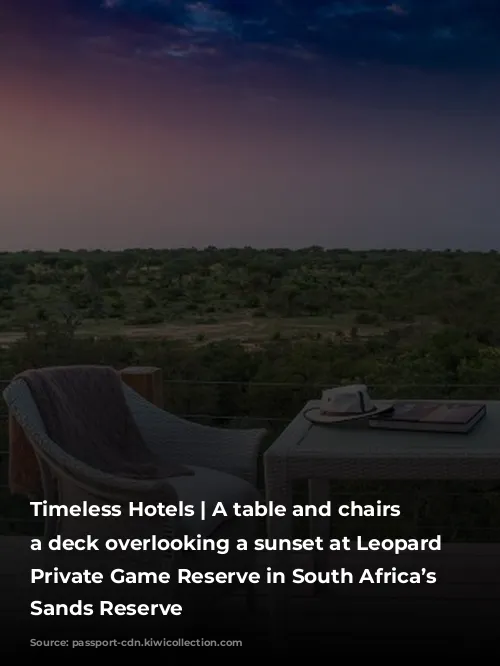 Timeless Hotels | A table and chairs on a deck overlooking a sunset at Leopard Hills Private Game Reserve in South Africa’s Sabi Sands Reserve