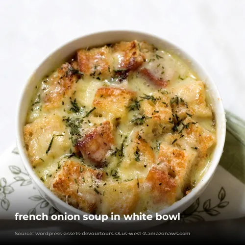 french onion soup in white bowl