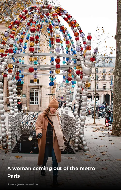 A woman coming out of the metro in Paris