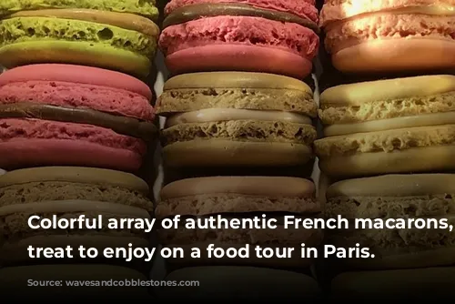 Colorful array of authentic French macarons, a treat to enjoy on a food tour in Paris.