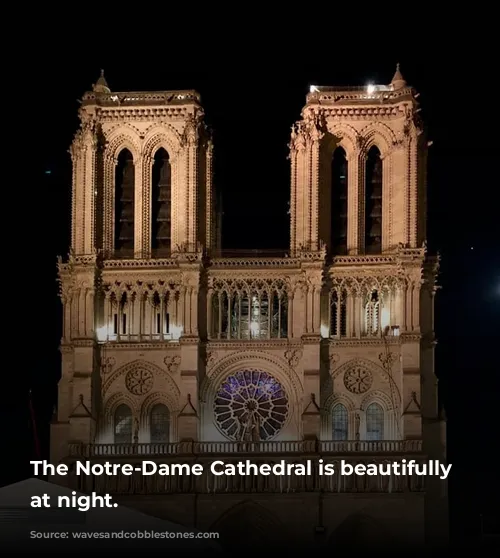 The Notre-Dame Cathedral is beautifully illuminated at night.