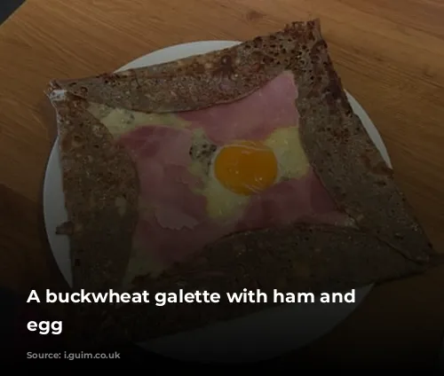 A buckwheat galette with ham and fried egg