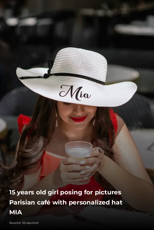 15 years old girl posing for pictures in Parisian café with personalized hat saying MIA