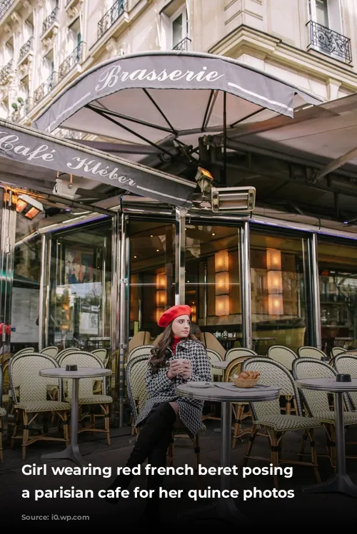 Girl wearing red french beret posing in a parisian cafe for her quince photos