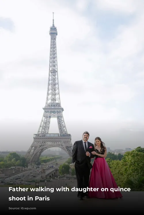 Father walking with daughter on quince photo shoot in Paris