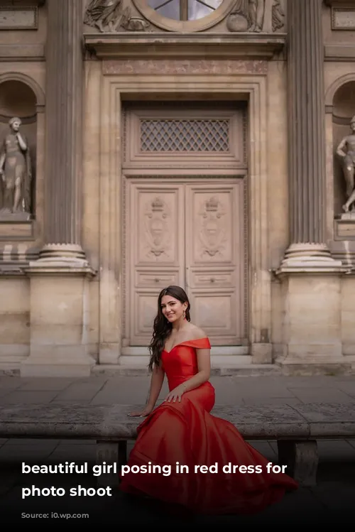 beautiful girl posing in red dress for quinceanera photo shoot