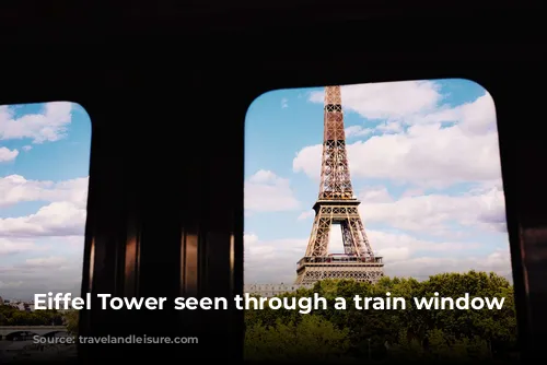 Eiffel Tower seen through a train window