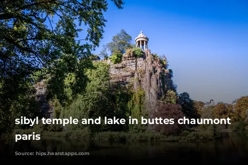 sibyl temple and lake in buttes chaumont park, paris