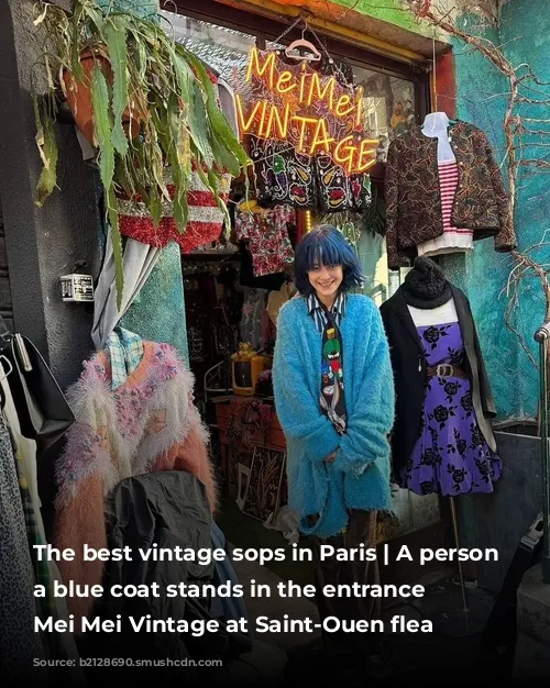 The best vintage sops in Paris | A person in a blue coat stands in the entrance of Mei Mei Vintage at Saint-Ouen flea market