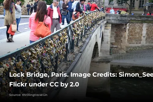 Lock Bridge, Paris. Image Credits: Simon_Sees, via Flickr under CC by 2.0