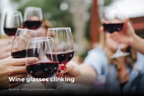 Wine glasses clinking