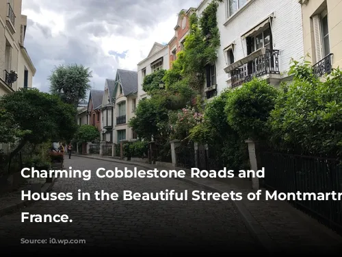 Charming Cobblestone Roads and Pastel Houses in the Beautiful Streets of Montmartre. Paris, France.