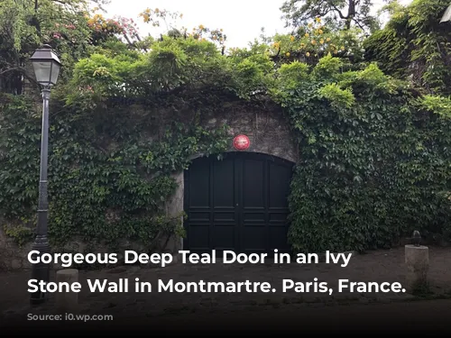 Gorgeous Deep Teal Door in an Ivy Covered Stone Wall in Montmartre. Paris, France.