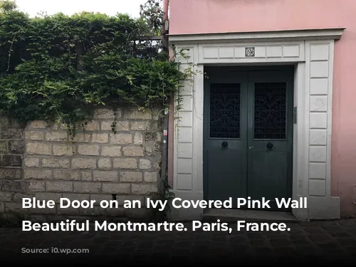 Blue Door on an Ivy Covered Pink Wall in Beautiful Montmartre. Paris, France.