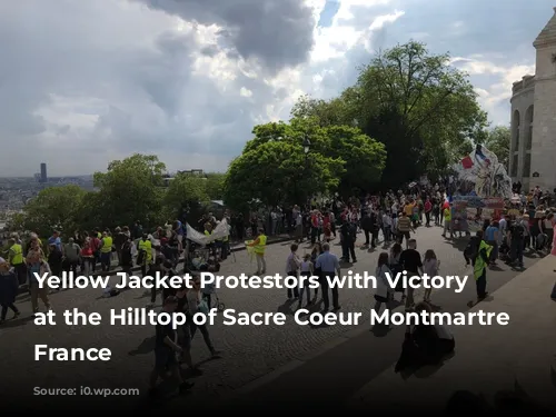 Yellow Jacket Protestors with Victory Sign at the Hilltop of Sacre Coeur Montmartre Paris France