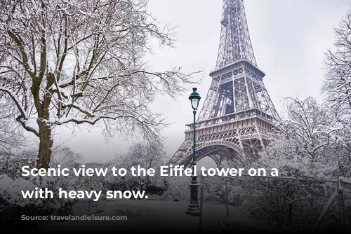 Scenic view to the Eiffel tower on a day with heavy snow.