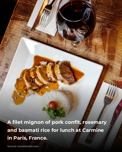 A filet mignon of pork confit, rosemary jus and basmati rice for lunch at Carmine Cafe in Paris, France.