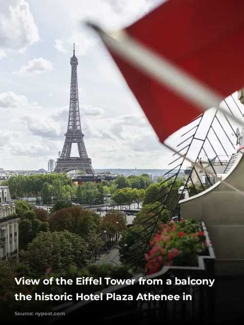 View of the Eiffel Tower from a balcony of the historic Hotel Plaza Athenee in Paris