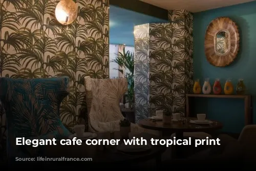 Elegant cafe corner with tropical print chairs.