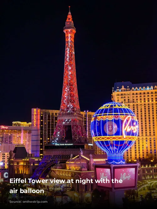 Eiffel Tower view at night with the hot air balloon