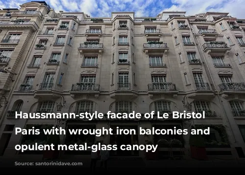 Haussmann-style facade of Le Bristol in Paris with wrought iron balconies and an opulent metal-glass canopy