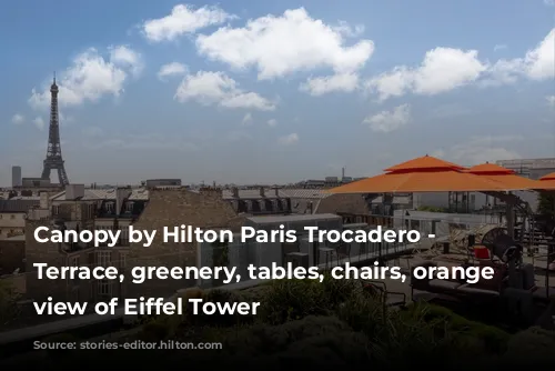 Canopy by Hilton Paris Trocadero - Rooftop Terrace, greenery, tables, chairs, orange umbrellas, view of Eiffel Tower