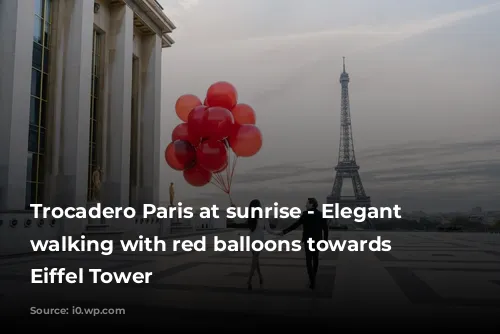 Trocadero Paris at sunrise - Elegant couple walking with red balloons towards the Eiffel Tower